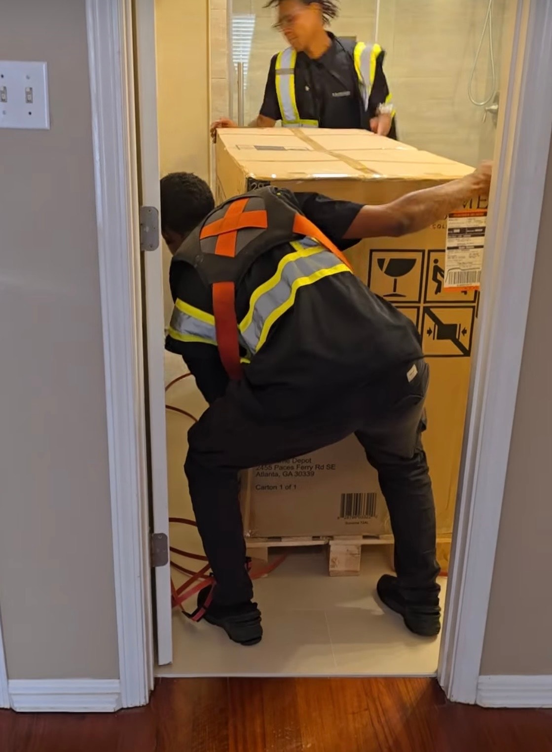Inside the TTC box truck loaded with wrapped appliances on pallets